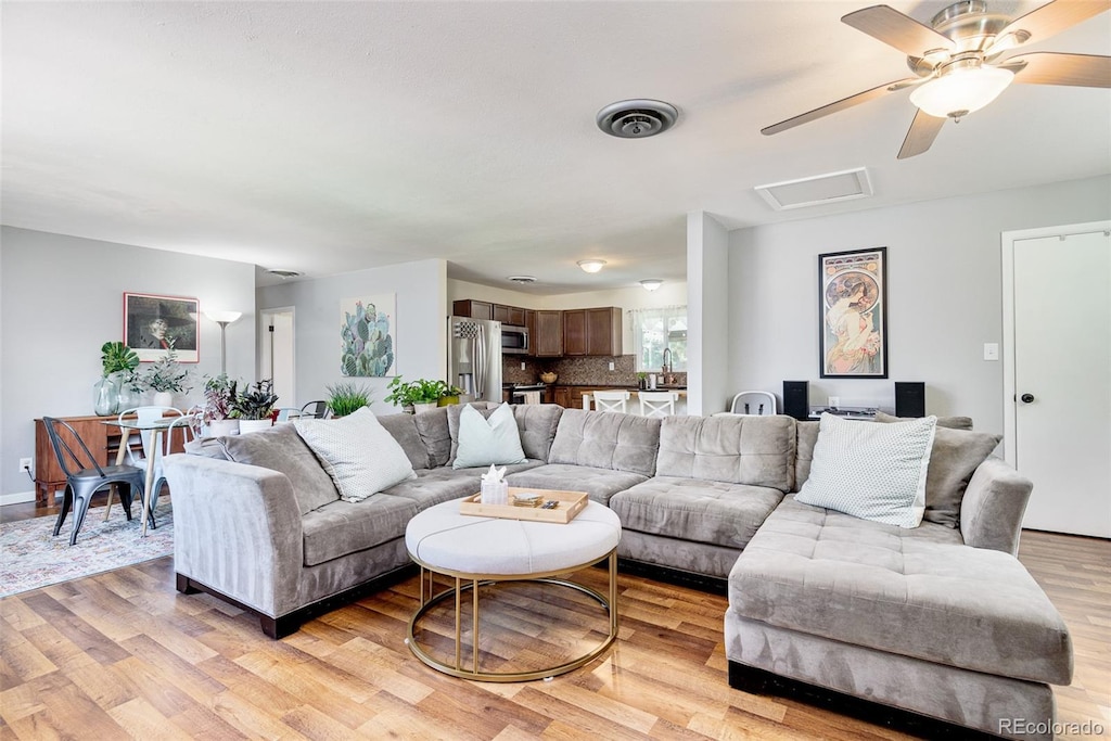 living room featuring light wood-type flooring