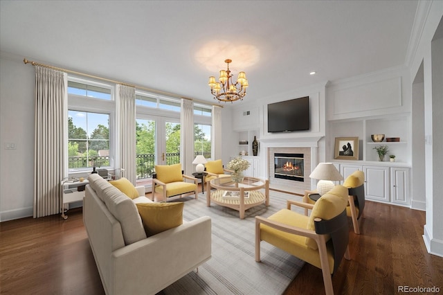 300 Hudson St Unit 203, Denver, CO 80220 - living room featuring a chandelier, wood finished floors, a glass covered fireplace, built in features, and recessed lighting