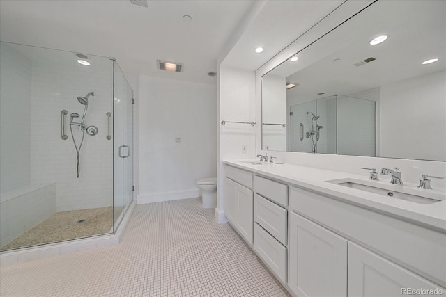 300 Hudson St Unit 203, Denver, CO 80220 - bathroom with a stall shower, recessed lighting, double vanity, and tile patterned floors