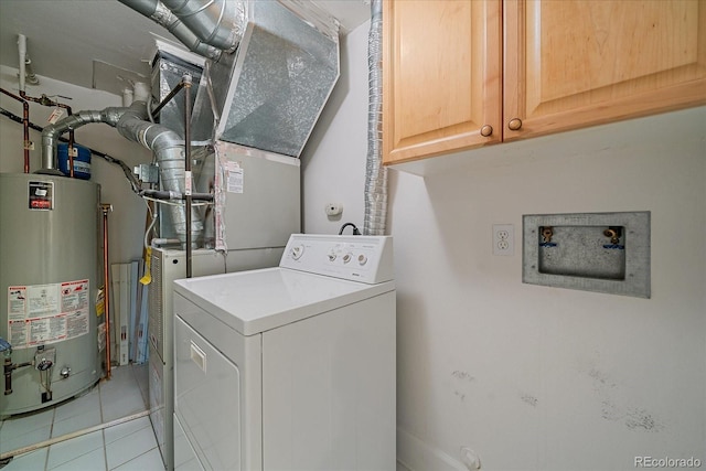 300 Hudson St Unit 203, Denver, CO 80220 - laundry area featuring washer / dryer, water heater, cabinet space, and light tile patterned floors