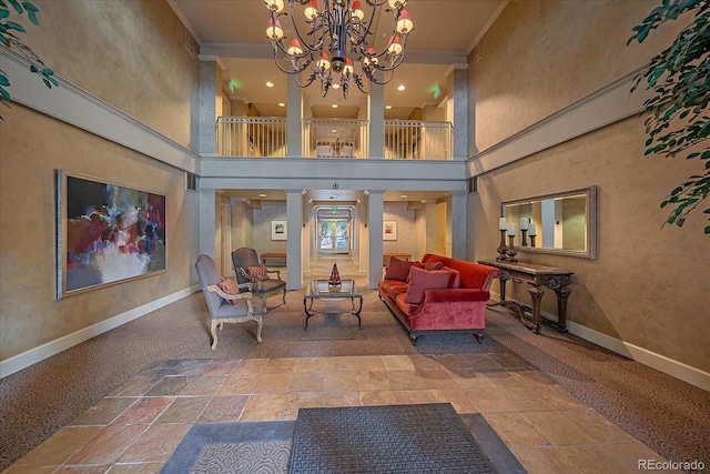 300 Hudson St Unit 203, Denver, CO 80220 - community lobby featuring crown molding and a high ceiling