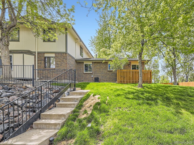 view of yard featuring stairway