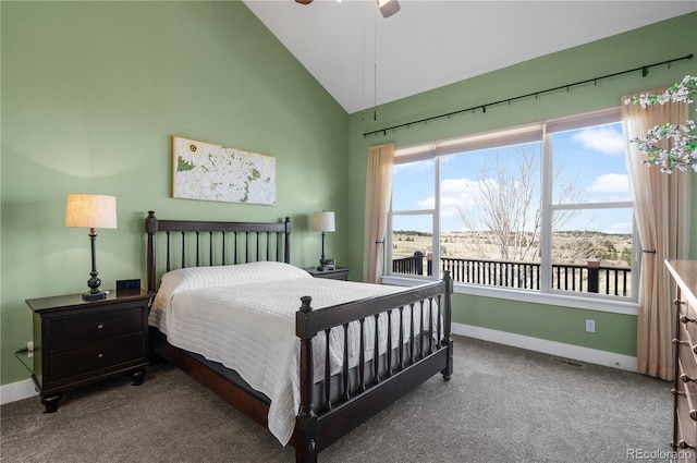carpeted bedroom with high vaulted ceiling, baseboards, and a ceiling fan