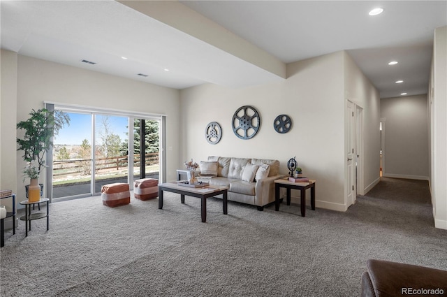 living room with baseboards, carpet floors, visible vents, and recessed lighting