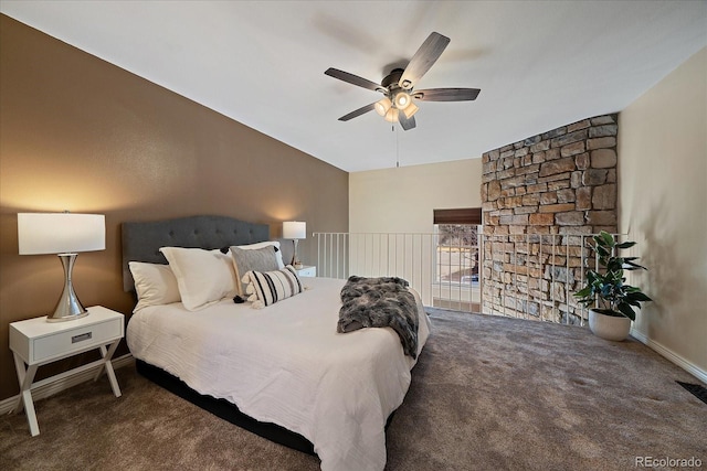 carpeted bedroom featuring ceiling fan, vaulted ceiling, visible vents, and baseboards