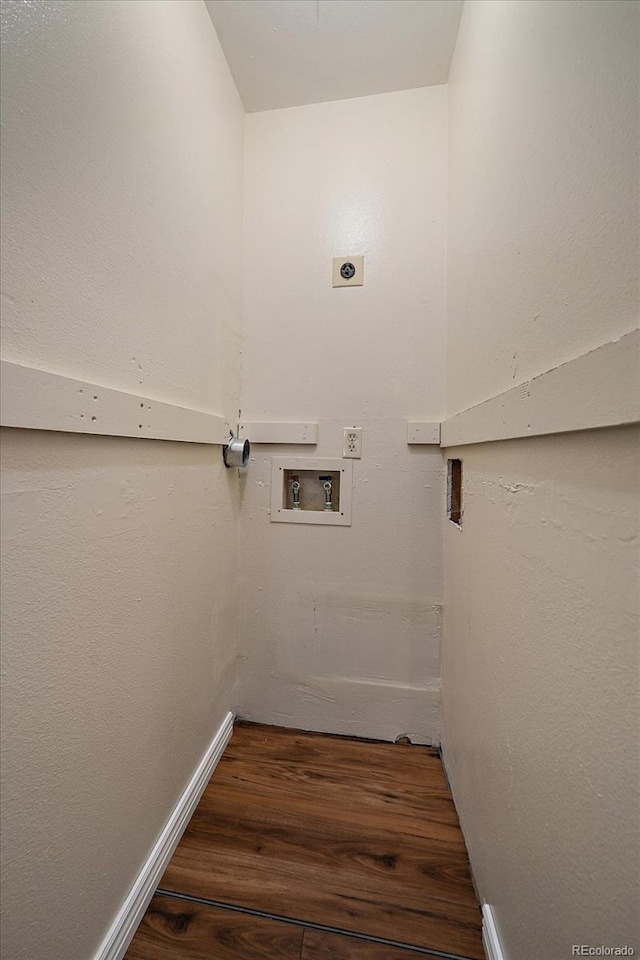 washroom with laundry area, washer hookup, wood finished floors, baseboards, and electric dryer hookup