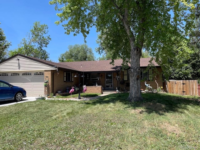 9115 W 2nd Ave, Lakewood, CO 80226 - ranch-style home featuring a garage, brick siding, and driveway