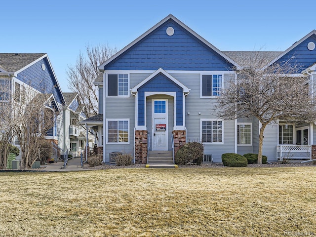 view of front facade with a front yard