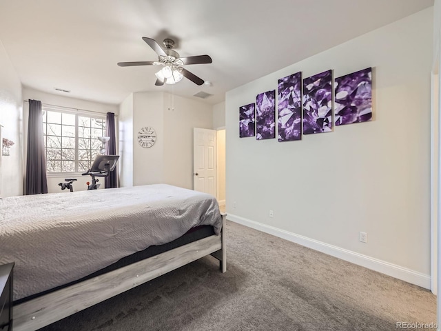 carpeted bedroom with visible vents, baseboards, and ceiling fan