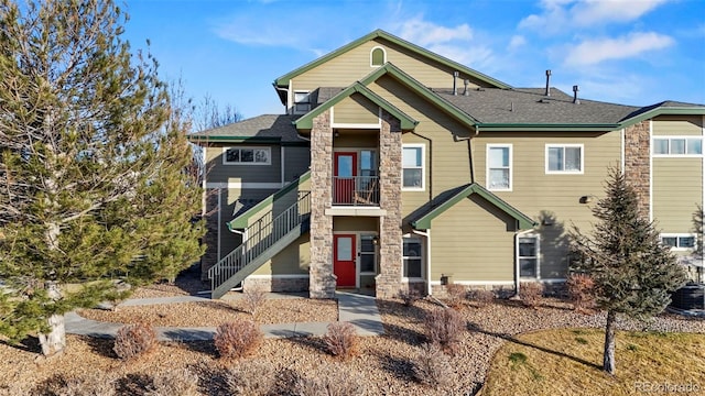 view of front of home with a balcony