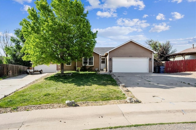 1115 Cherry Ct, Fort Lupton, CO 80621 - view of front of house with an attached garage and concrete driveway