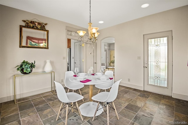 dining room featuring a chandelier