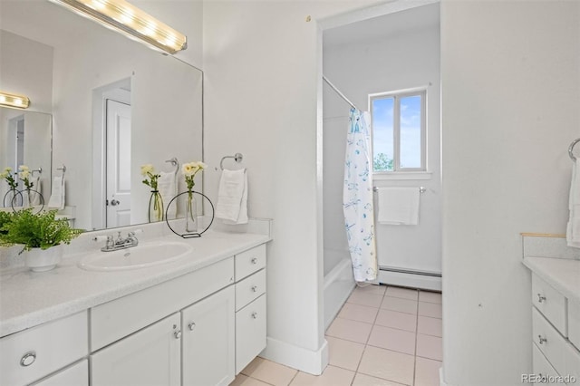 bathroom with vanity, a baseboard heating unit, shower / tub combo with curtain, and tile patterned flooring