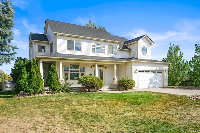 view of front of house with covered porch and a front lawn