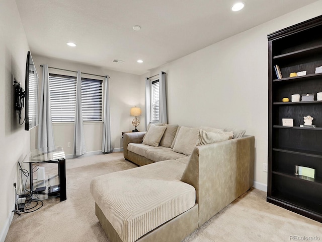 9844 Truckee St, Commerce City, CO 80022 - living room featuring baseboards, light carpet, visible vents, and recessed lighting