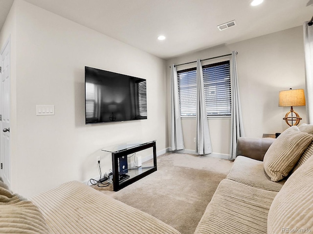 9844 Truckee St, Commerce City, CO 80022 - living area with baseboards, visible vents, recessed lighting, and light colored carpet