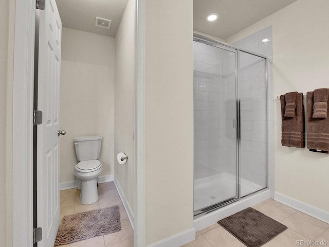 9844 Truckee St, Commerce City, CO 80022 - full bath with visible vents, tile patterned floors, a stall shower, and toilet