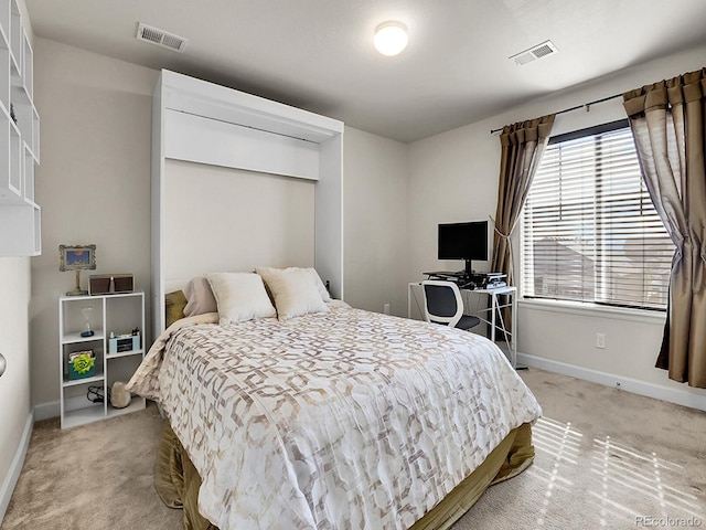 9844 Truckee St, Commerce City, CO 80022 - bedroom with light carpet, visible vents, and baseboards