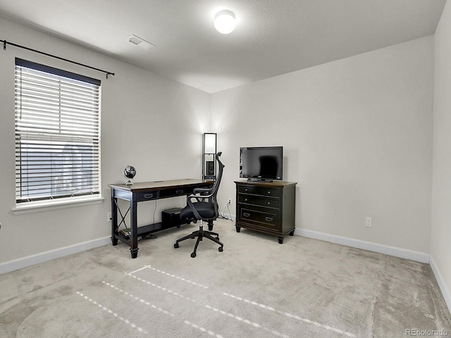 9844 Truckee St, Commerce City, CO 80022 - home office with baseboards, visible vents, and carpet