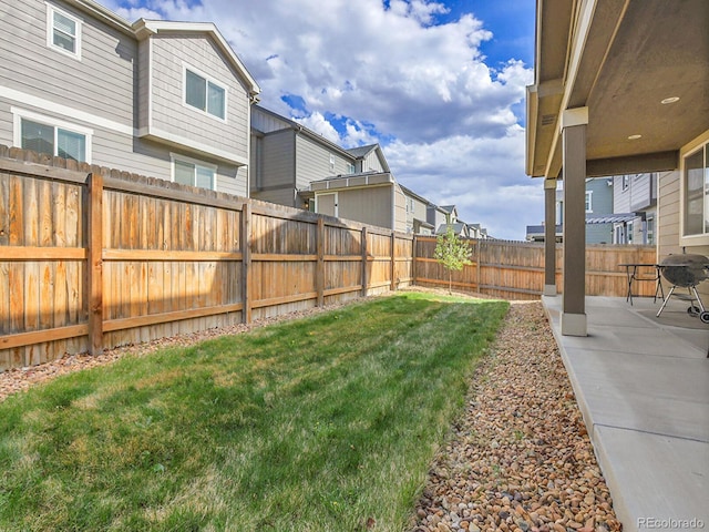 9844 Truckee St, Commerce City, CO 80022 - view of yard with a fenced backyard and a patio
