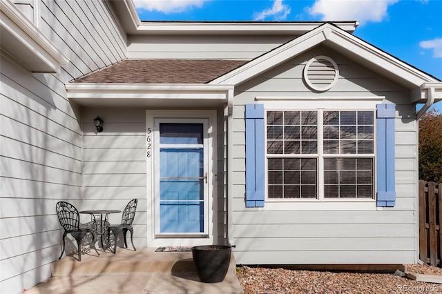 entrance to property with a patio