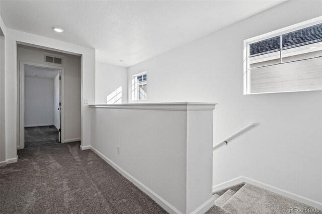 3282 N Catawba Way, Aurora, CO 80019 - hallway featuring dark colored carpet