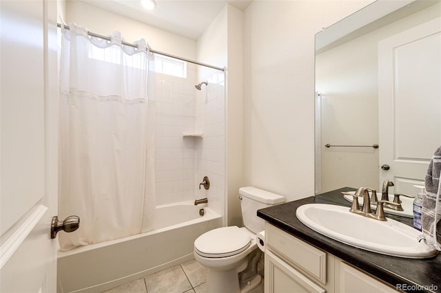 full bath with tile patterned flooring, vanity, toilet, and shower / bath combo with shower curtain