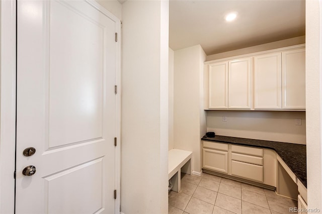 mudroom with light tile patterned floors