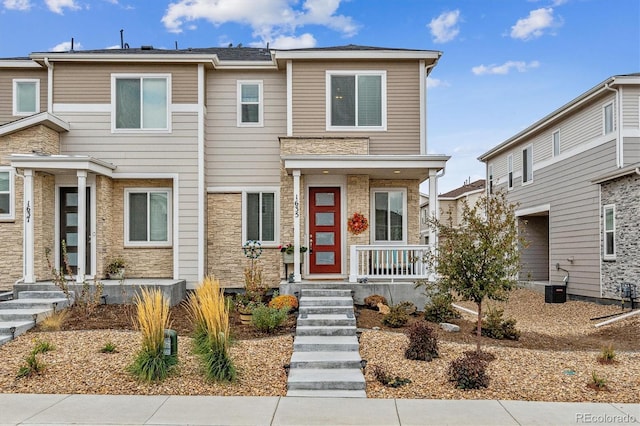 multi unit property featuring stone siding