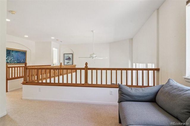 living area with ceiling fan, recessed lighting, carpet, and baseboards