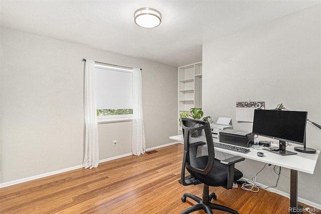 6731 Devinney St, Arvada, CO 80004 - office with light wood finished floors and baseboards