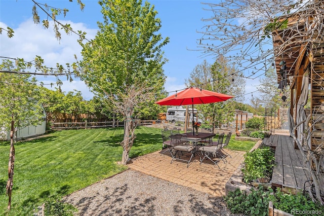 6731 Devinney St, Arvada, CO 80004 - view of yard with a patio area and outdoor dining area