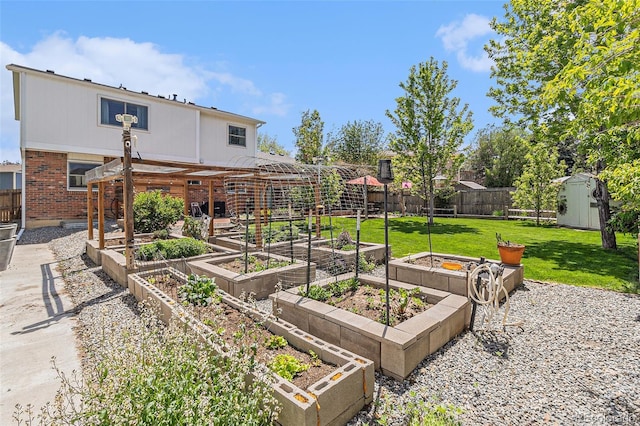 6731 Devinney St, Arvada, CO 80004 - view of yard with a vegetable garden, a storage unit, and an outdoor structure