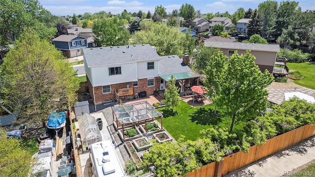 6731 Devinney St, Arvada, CO 80004 - aerial perspective of suburban area
