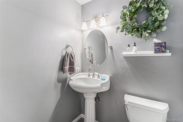 6731 Devinney St, Arvada, CO 80004 - bathroom featuring toilet