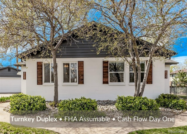6133 S Sterne Cir, Littleton, CO 80120 - view of side of property with an outbuilding and a garage