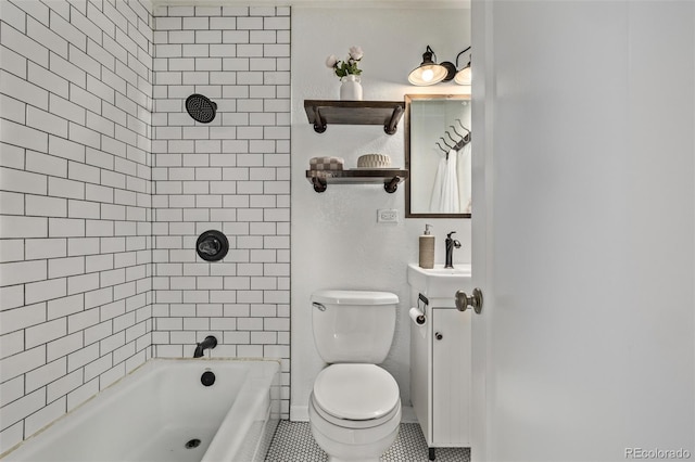 6133 S Sterne Cir, Littleton, CO 80120 - full bathroom featuring shower / bath combination, tile patterned floors, toilet, and a sink