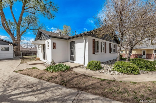 6133 S Sterne Cir, Littleton, CO 80120 - view of front of property featuring concrete block siding and fence