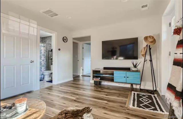 150 S Osceola St, Denver, CO 80219 - living room with wood finished floors and baseboards