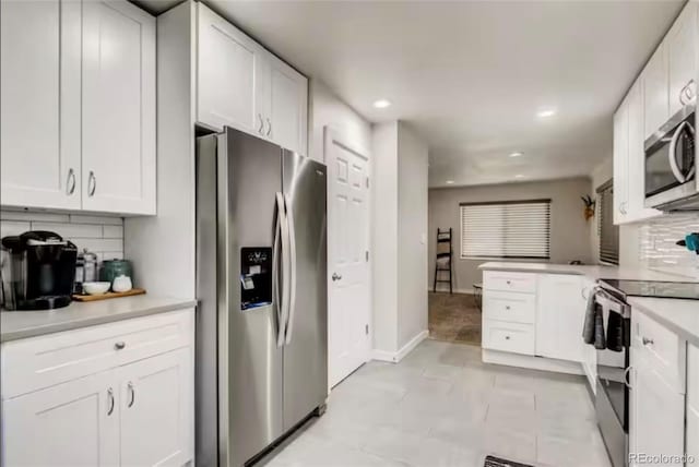 150 S Osceola St, Denver, CO 80219 - kitchen featuring appliances with stainless steel finishes, backsplash, light countertops, recessed lighting, and white cabinets