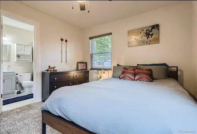 150 S Osceola St, Denver, CO 80219 - bedroom with connected bathroom, ceiling fan, and carpet floors