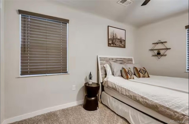 150 S Osceola St, Denver, CO 80219 - carpeted bedroom with baseboards and ceiling fan
