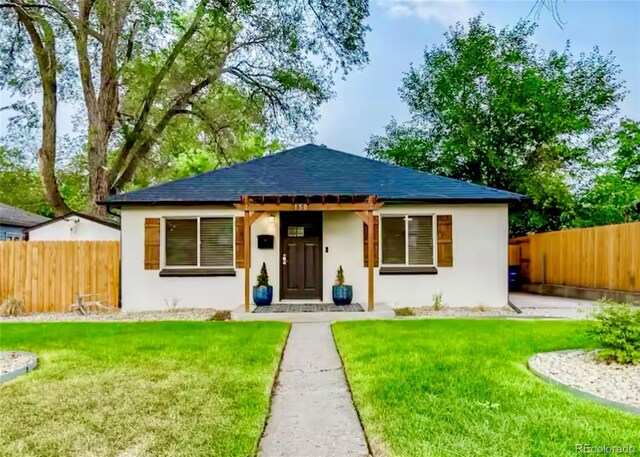 150 S Osceola St, Denver, CO 80219 - view of front of house with stucco siding and roof with shingles