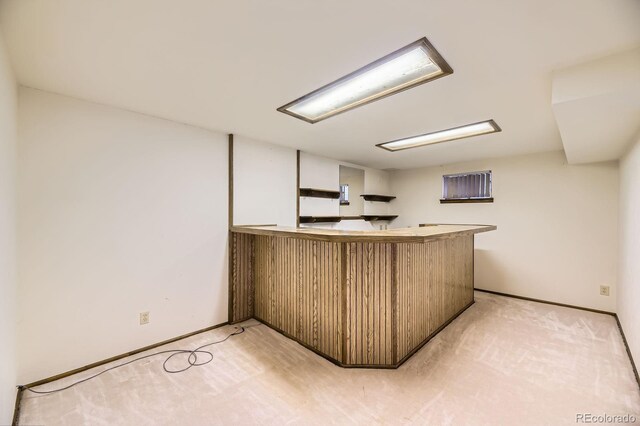 2370 Redwood Ave, Lafayette, CO 80026 - kitchen with a peninsula and baseboards