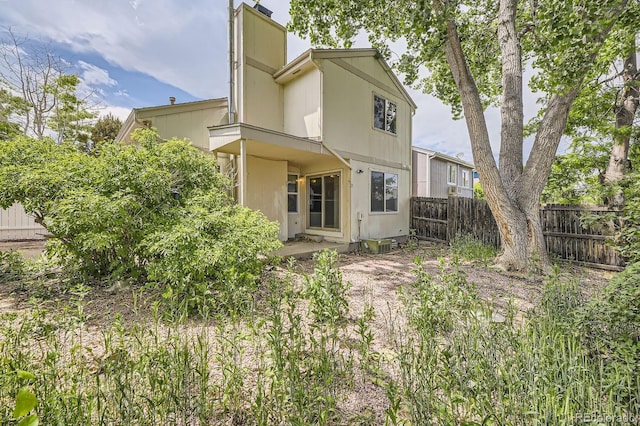 2370 Redwood Ave, Lafayette, CO 80026 - back of property featuring a chimney