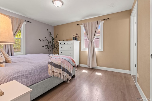 bedroom featuring light wood-type flooring