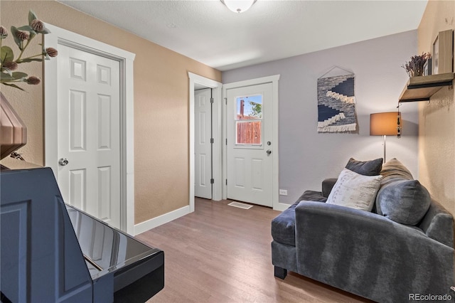 living room with hardwood / wood-style flooring