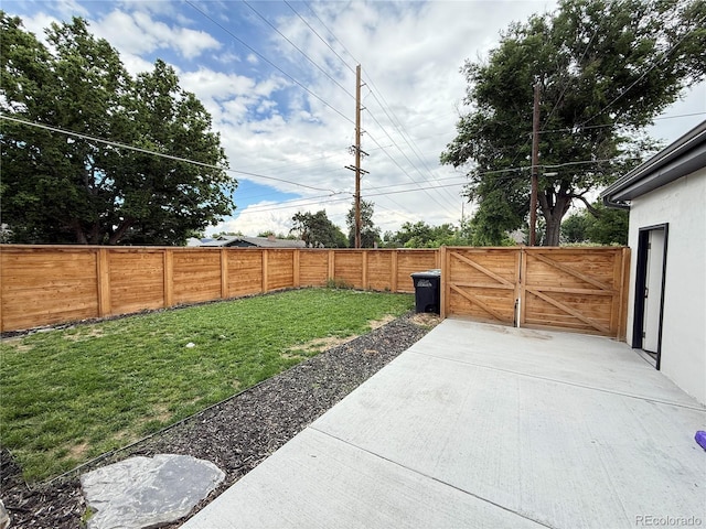 1694 Xanthia St, Denver, CO 80220 - view of yard featuring a patio and a gate