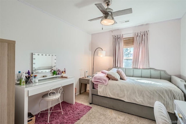 carpeted bedroom with ceiling fan