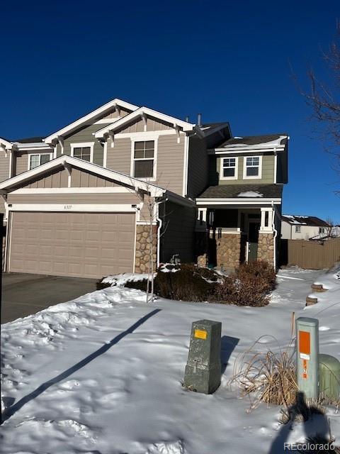 view of front of property featuring a garage